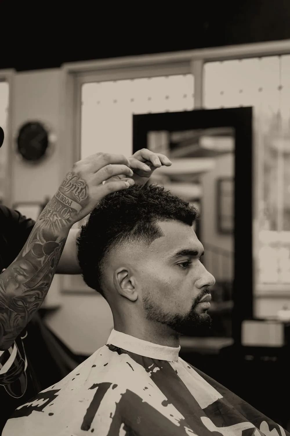 Barber du Cercle coiffant un client